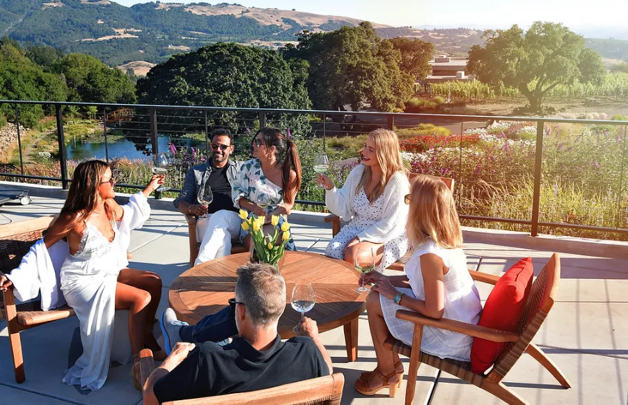 A group of outdoor wine tasters at Coursey Graves